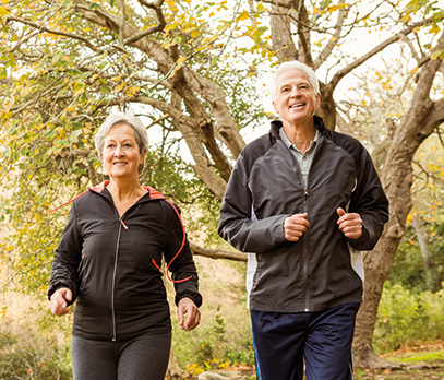 Senior couple in the park on an autumns day